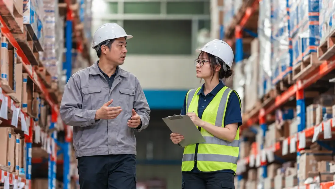 Our team member talking with factory staff